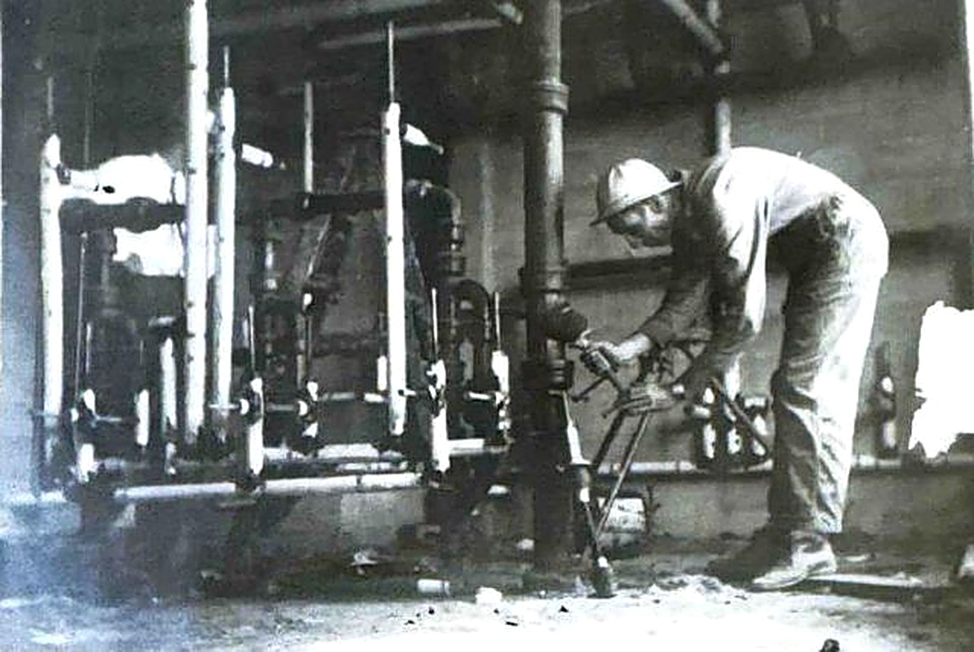 Clifford Balzli Sr. on a 1960s piping job