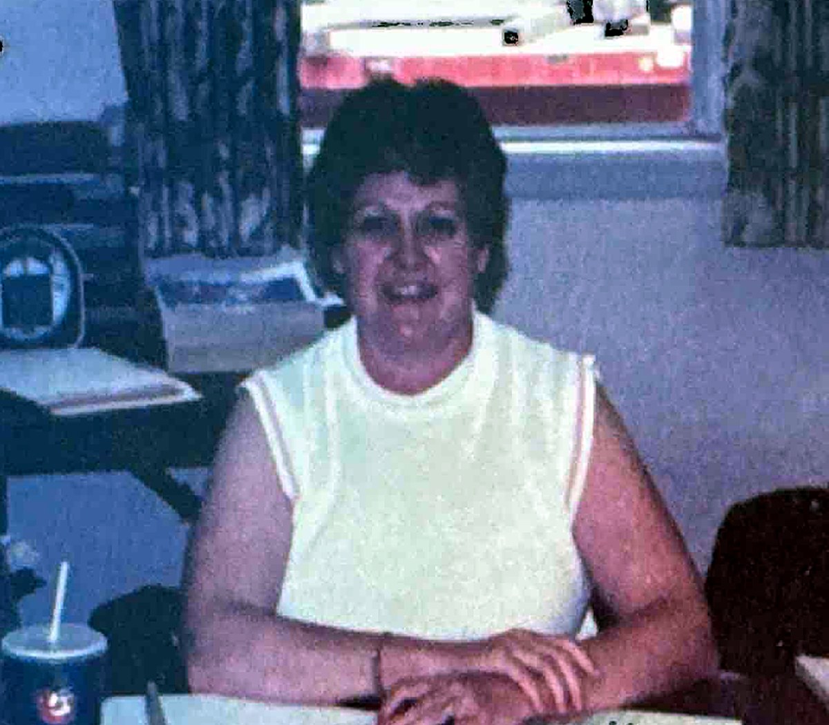 Diane Mayfield at her desk in the EMCO office
