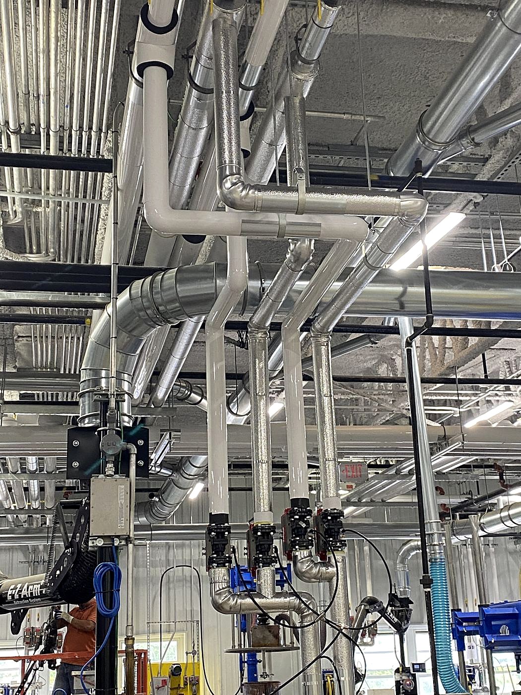 Overhead stainless piping runs