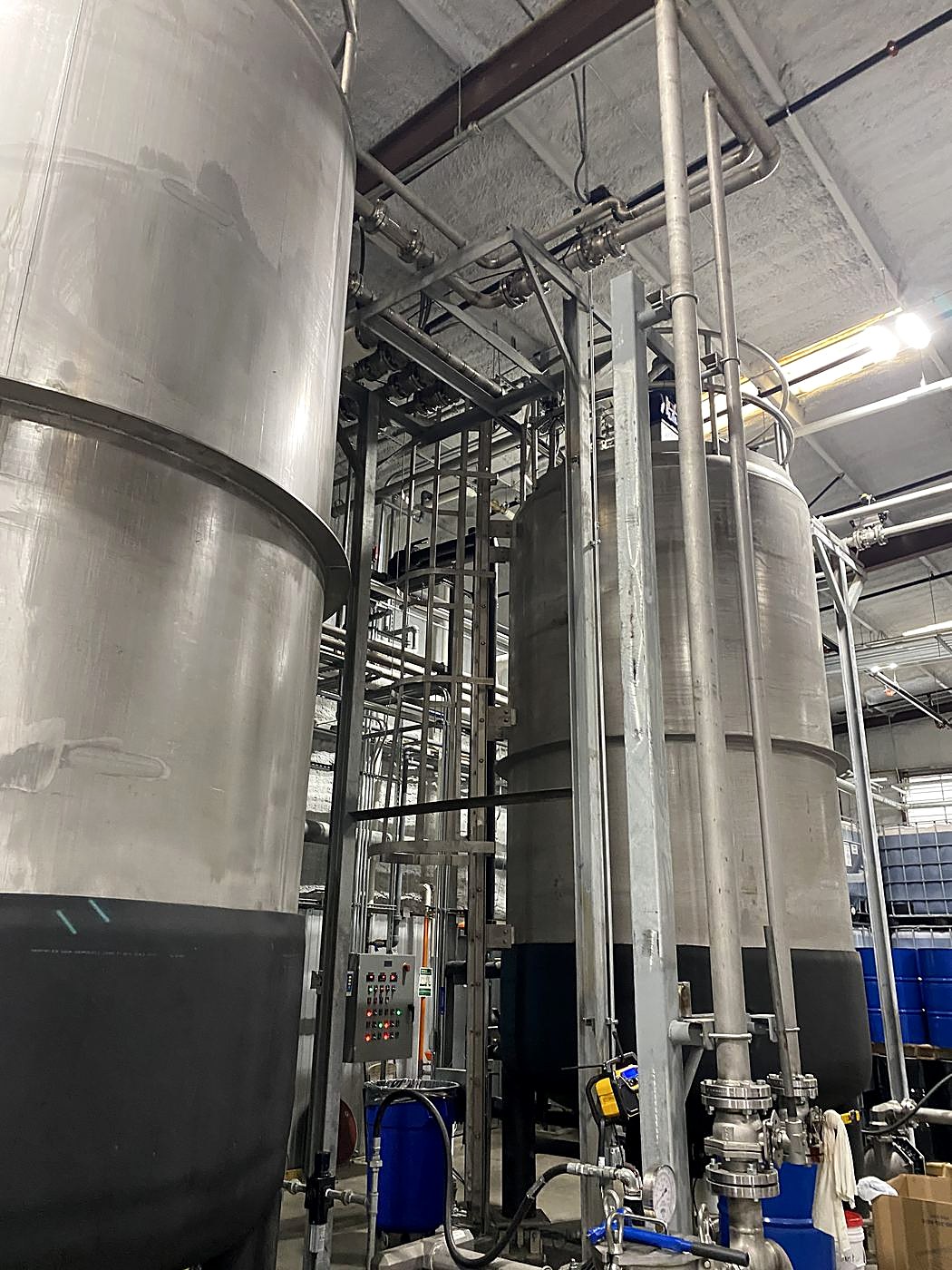 Pressurized blend vessels with stainless piping at Creative Polymer Solutions